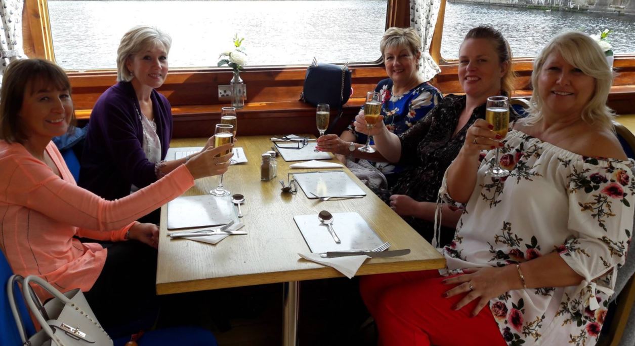 Wine & Dine Time with friends saying cheers to good times.