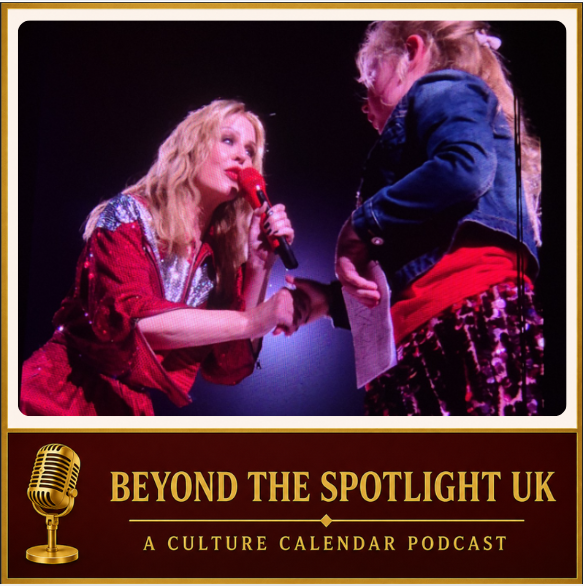 Kylie Minogue on stage with Poppy from Liverpool during a live concert