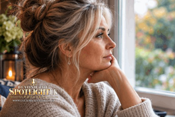 Woman looking out of a window thoughtful